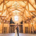 wedding couple dancing in custom barn kit event venue