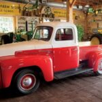 classic truck in custom barn kit garage